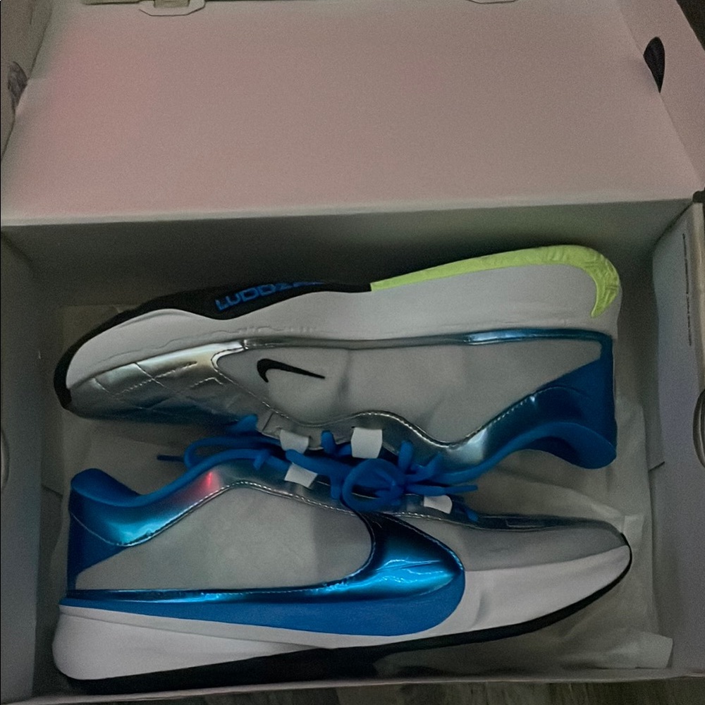 Nike  Blue and Silver Sneakers - Picture 1 of 9